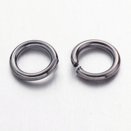Bindringar av mässing, 6mm, svarta (100st)