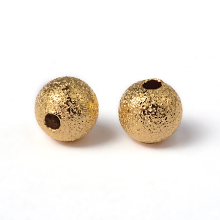 Mellandelar stardust av mässing guld 4 mm (50st)