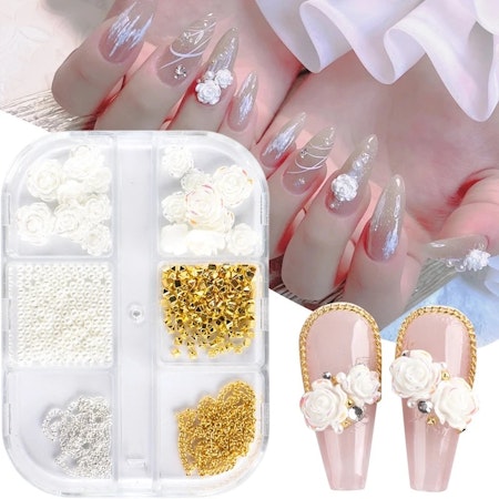 Ask med nailart, guld&pärlemor, kedjor, nitar & rosor