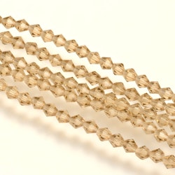 Sträng Biconeslipade champagne kristallimitation, 2x3mm (ca160-180st)