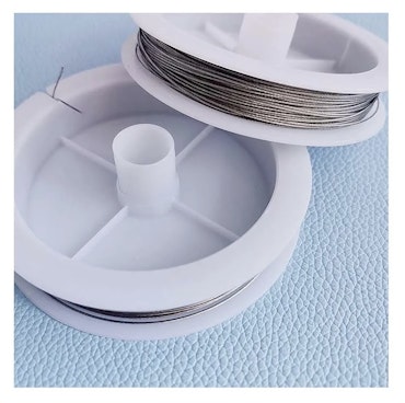 Rulle med tiger tail, platinum, 0.38mm (50m)