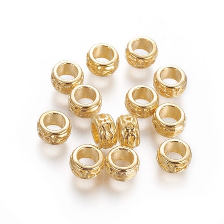 Rondell tibetisk av blandmetall guld 6x3 mm (25st)