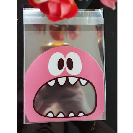 Cellofanpåsar med rosa monster, 10x7cm (10st)