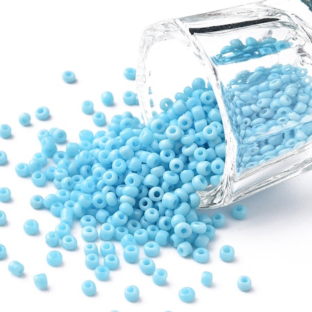 12/0, Seed beads av glas, ojämna ljusblå (50g)