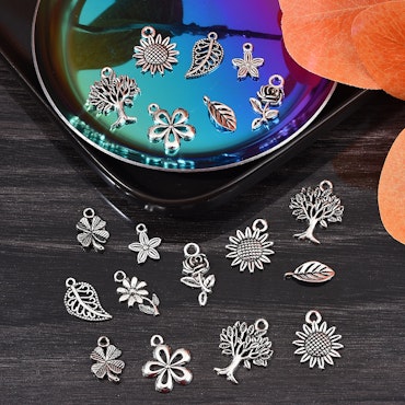 Berlocker av blandmetall, tema natur, antik silver (10st)