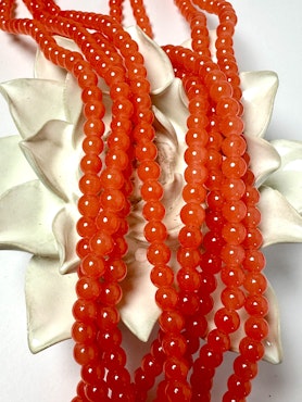 Sträng med glaspärlor, Jadeimitation, korall, 6,5mm (140st)