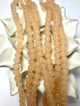Sträng med glaspärlor, Jadeimitation, peach, 6,5mm (140st)