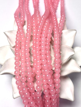 Sträng med glaspärlor, Jadeimitation, pink, 6,5mm (140st)