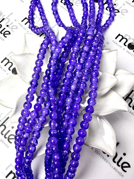 Sträng glaspärlor, dovt krackelerad, im so violet, 6mm (133st)