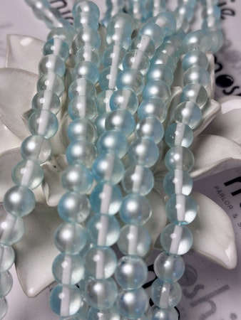 Sträng glaspärlor, night and day clear, light turquoise, 10mm (85st)