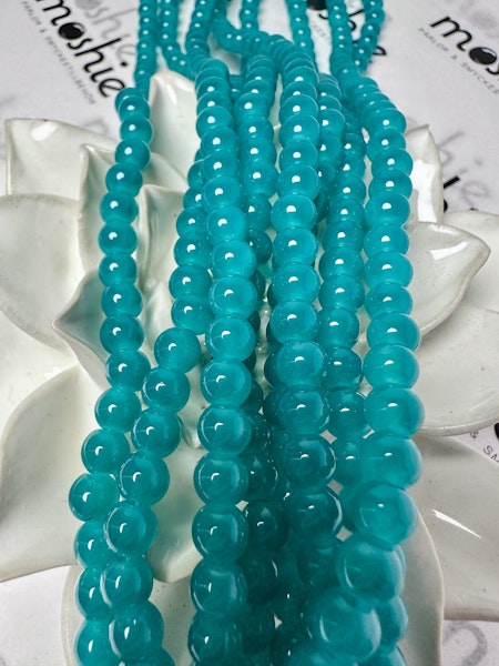 Sträng med glaspärlor, Jadeimitation, light teal, 6,5mm (128st)