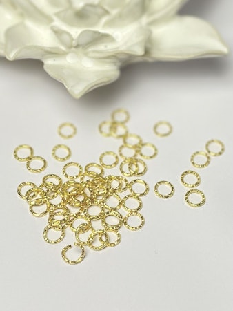 Bindringar twist av järn, 7,5x8,5mm, guld (50st)