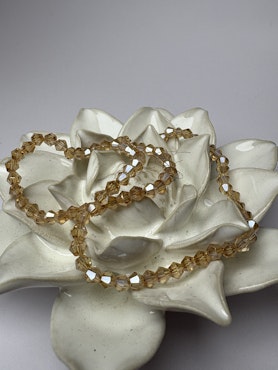Sträng biconeslipade glaspärlor, Golden Rosé 4mm (ca 85st)