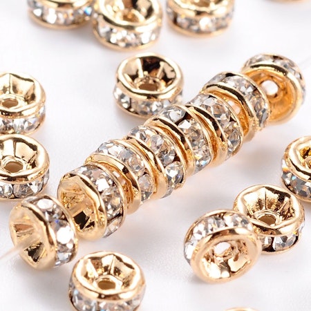 Strassrondell, 4mm, mässing, ljusguld, GradAAA (10st)