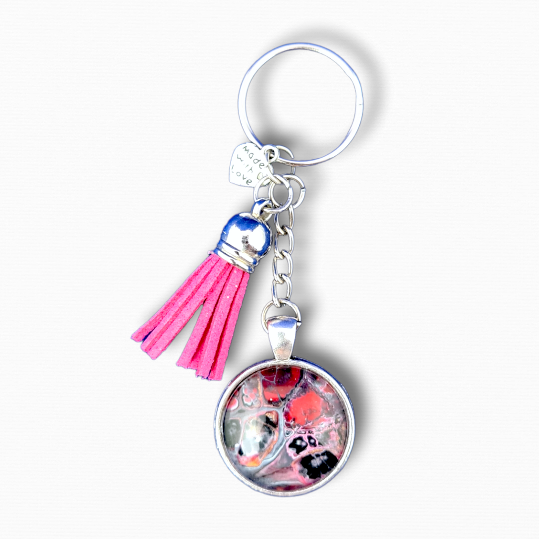 Nyckelring med rosa tofs - bellebi.se