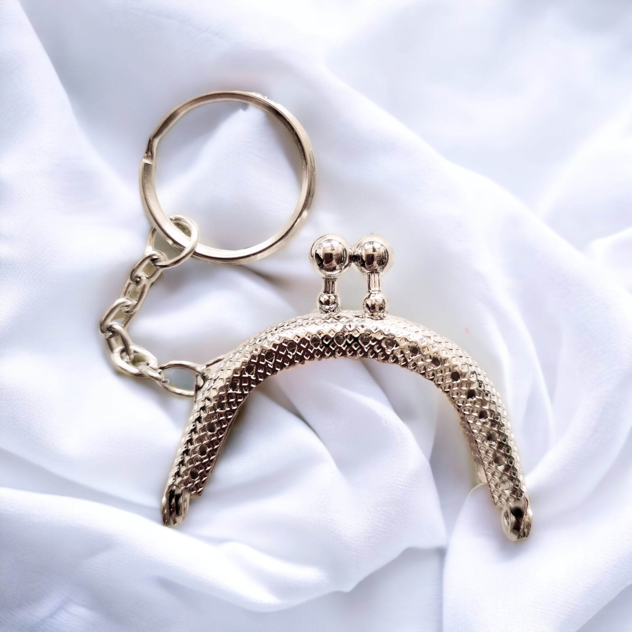 Metallhandtag med nyckelring