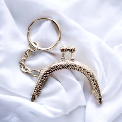 Metallhandtag med nyckelring