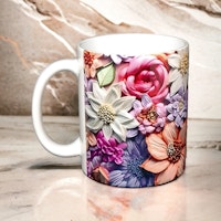 Mugg med "broderade" blommor