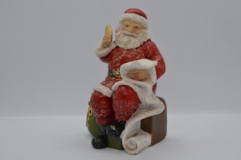 Nisse på jobb, skriver ``snille barn-liste``.