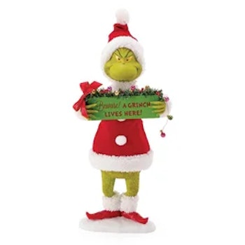 Grinch holder et advarsels skilt