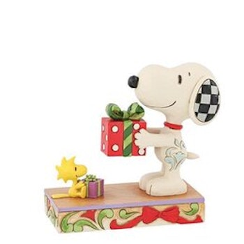 Snoopy og Woodstock bytter gaver.