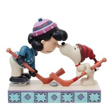 Snoopy og Lucy spiller ishockey