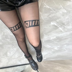 Tights with the text "Girls" on the thighs