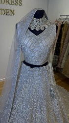 Bridal lehenga with tail white color