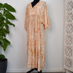 Klänning Mönstrad BEIGE