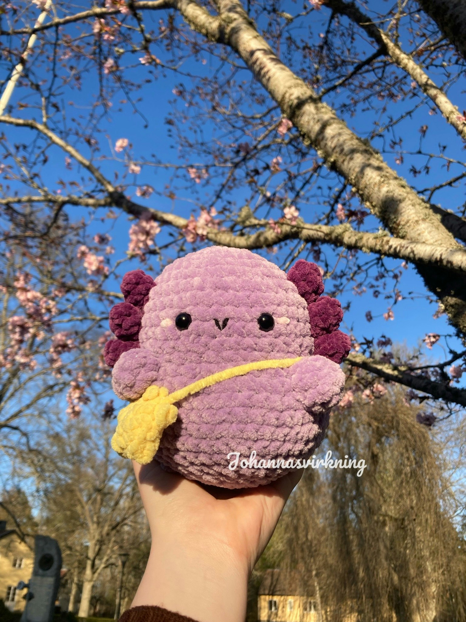 Glittrande axolotl