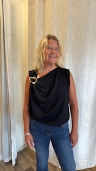 Topp med guldspänne