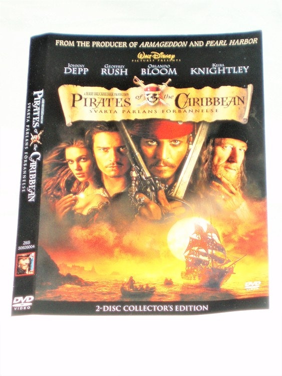 DVD Pirates of Caribbean skiva och omslag svensk text.normalt begagnat skick.