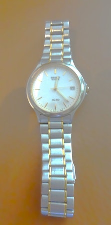 SEIKO QUARTZ Herrur SQ 100, ​Märkt med nr 224256. Boetten stl 3,7 cm.Begagnad