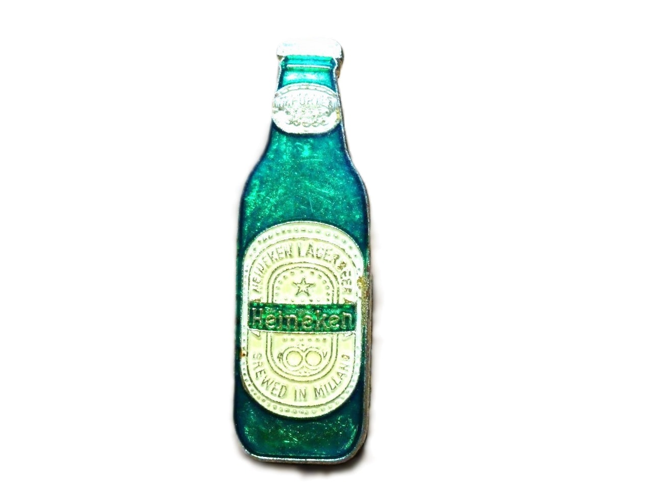Heineken Öl Pin. Holland. Motiv: Flaska.Mått ca 1.0 x 3.2 cm.Metall