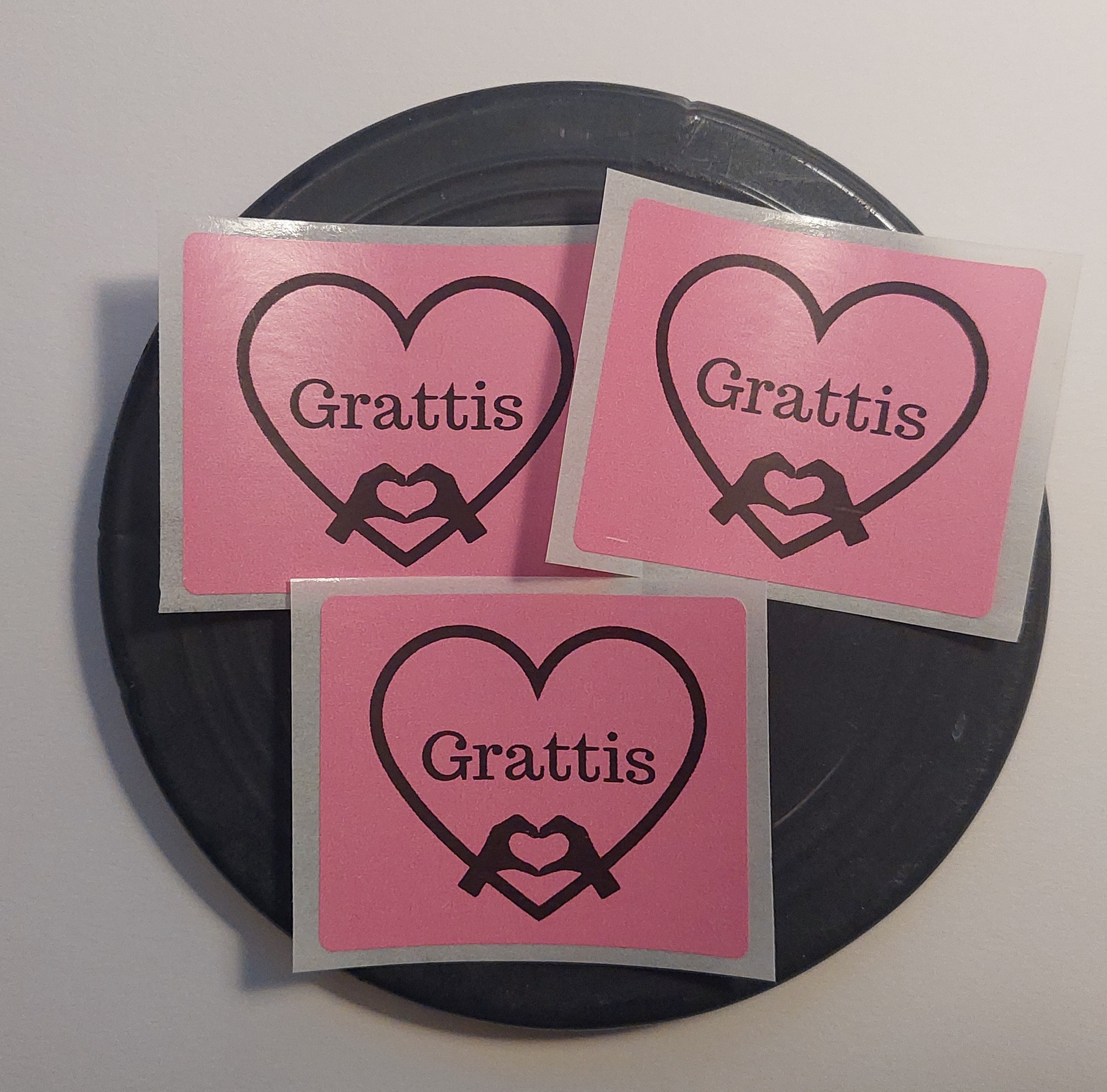 Etikett rosa grattis hjärta/hand