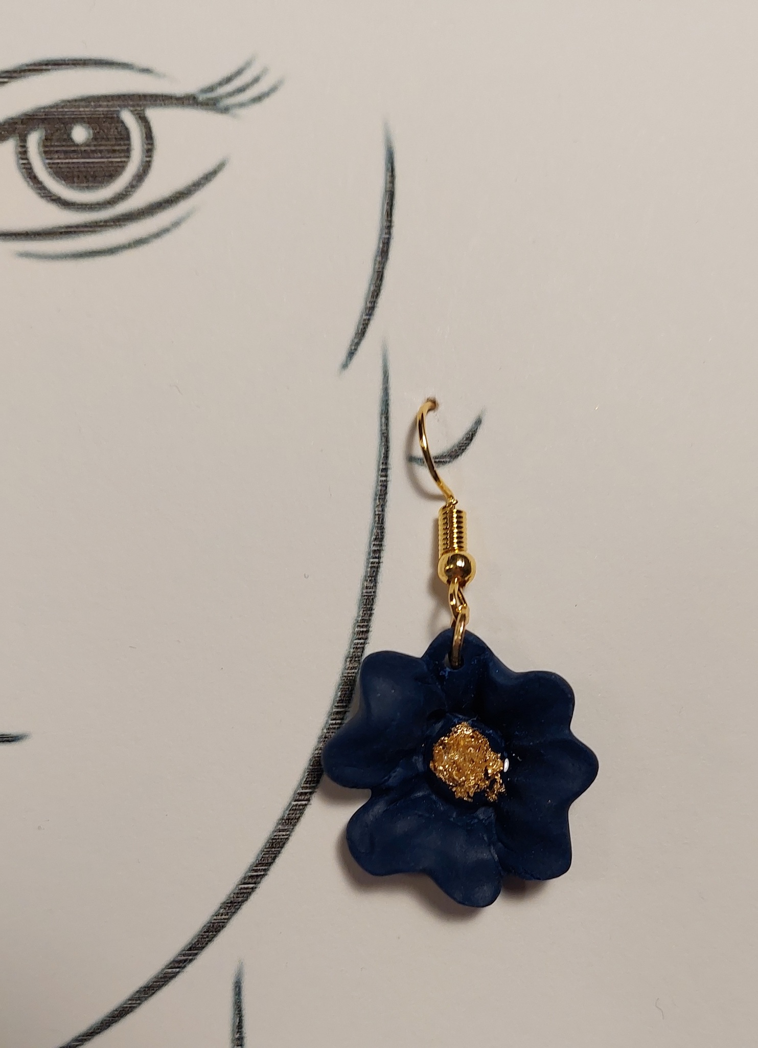 Örhänge hängande stor blomma i mörkblått