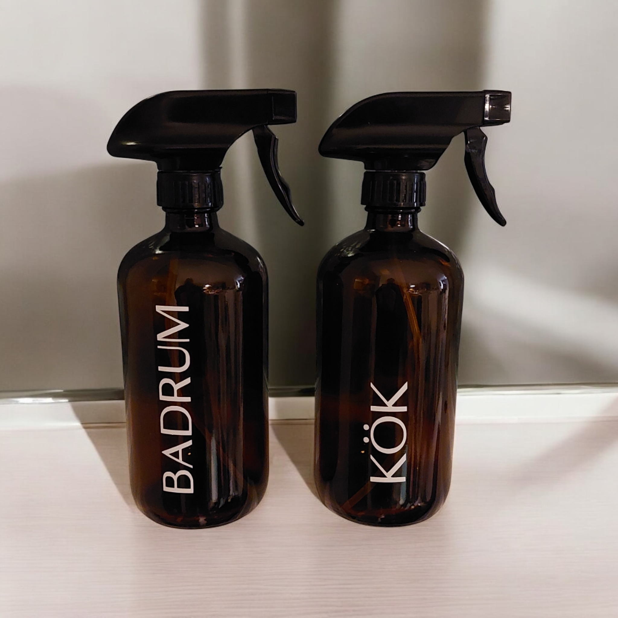 Sprayflaska med rak text
