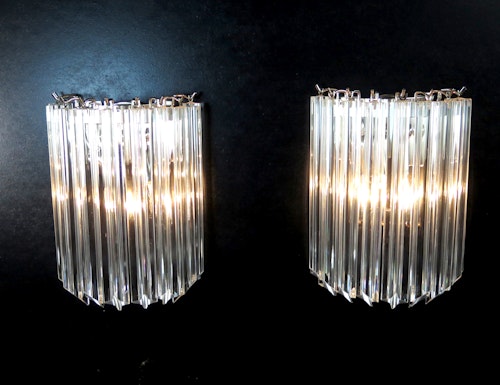 Ett par Murano vägglampor med varje 9st prismor