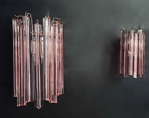Ett par Murano vägglampor varje med 9 prismor