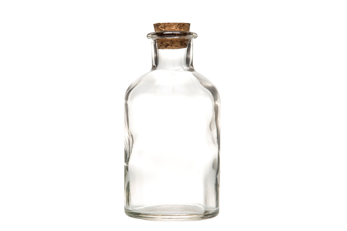 Klar glasflaske mellem