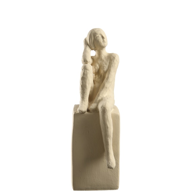 Figur kvinde sidder