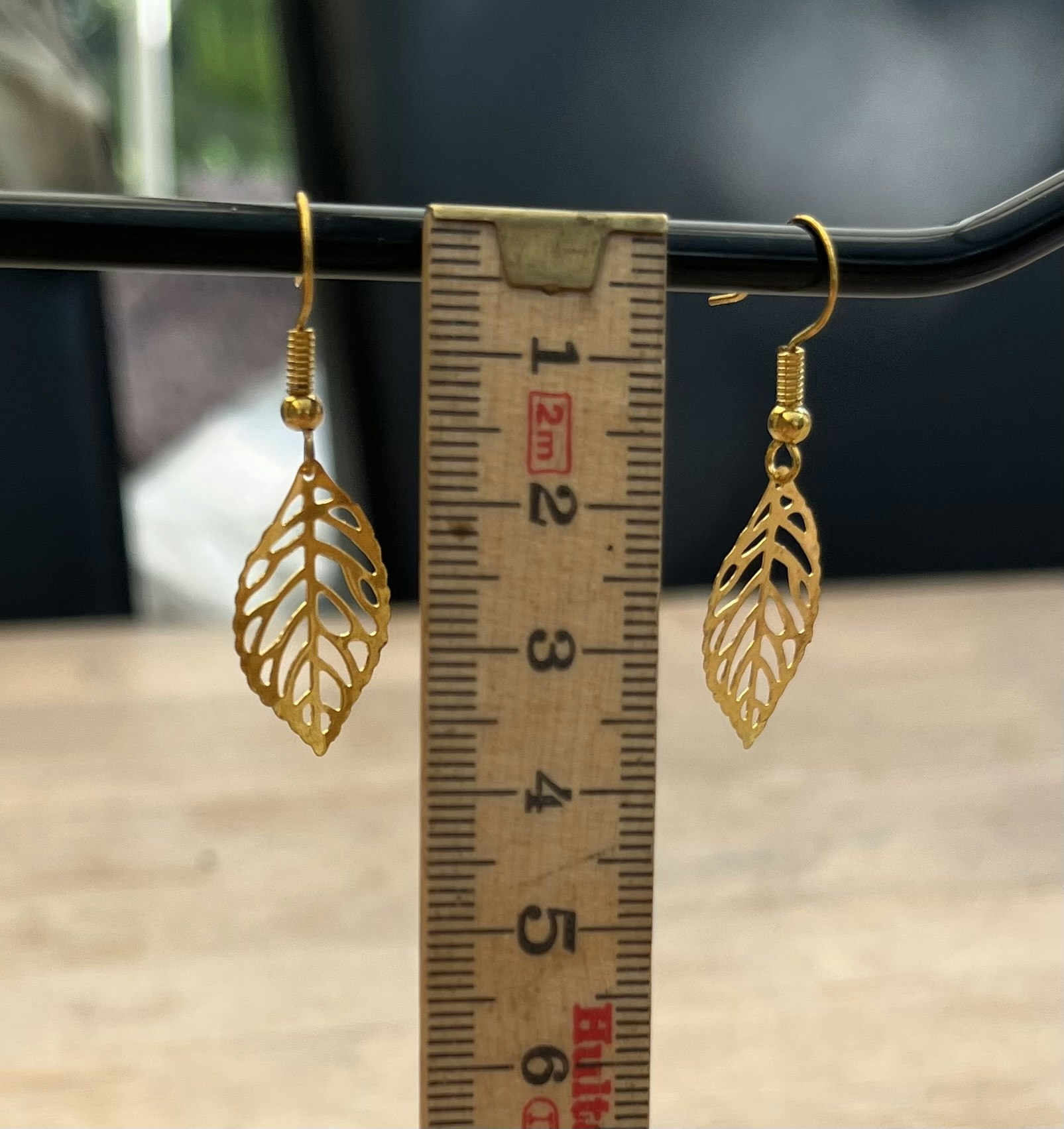 Elegante Bladøreringe i Guld