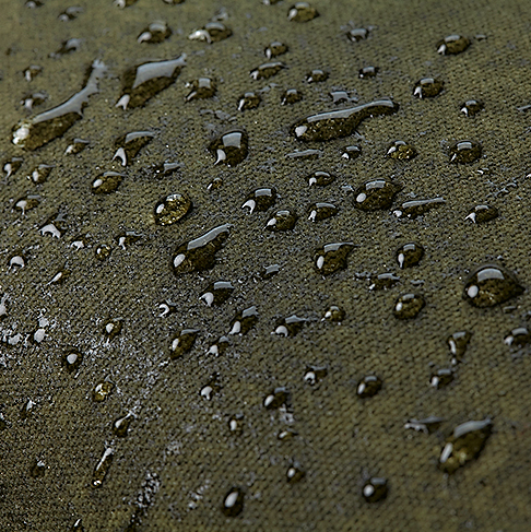 Olivgrön vaxad messengerbag