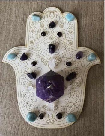 Kristallnät hamsa hand