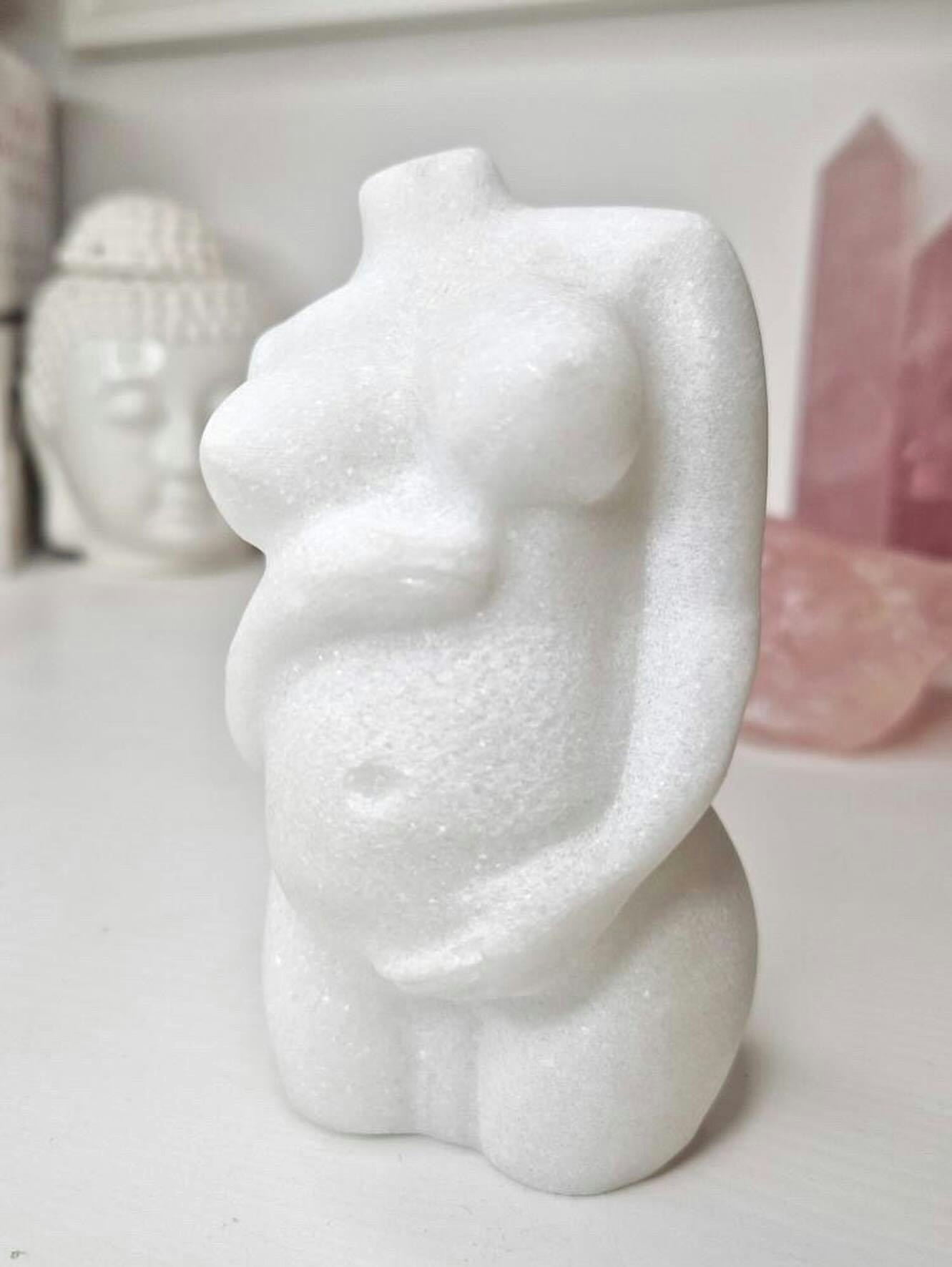 Gravid kvinnokropp i vit Jade