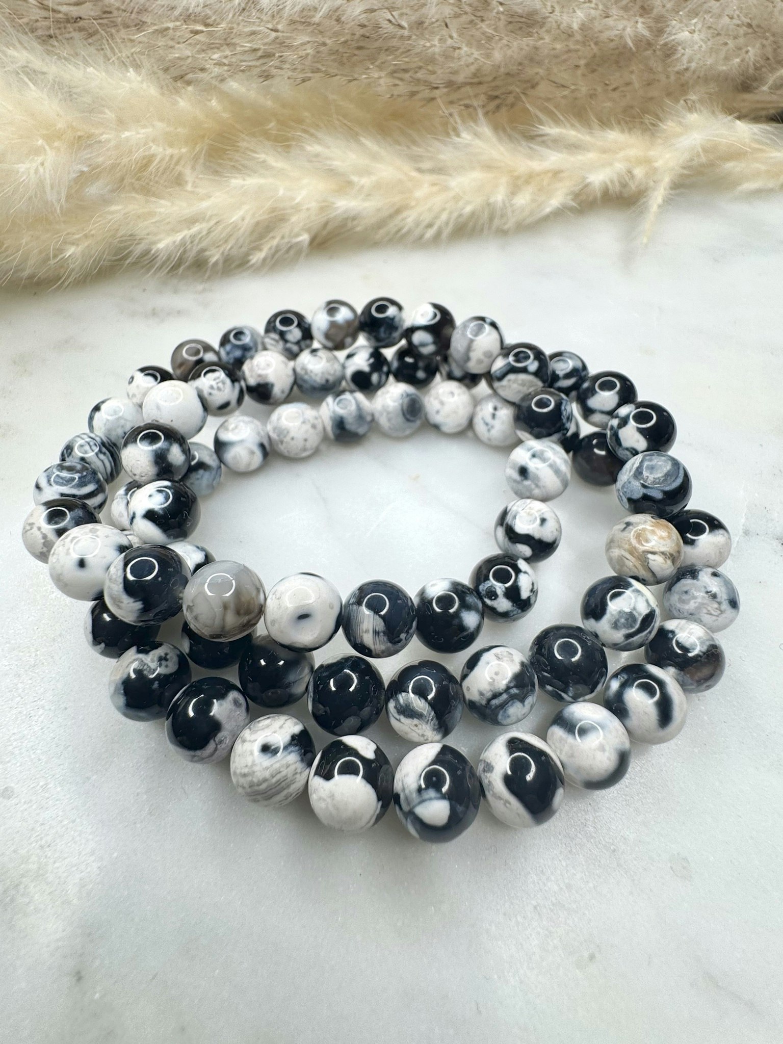 Spackhuggaragat armband 8mm kristall