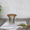 Glass tea mug with large stainless steel tea strainer, borosilicate glass mug for herbal tea. Infuser mug in glass.