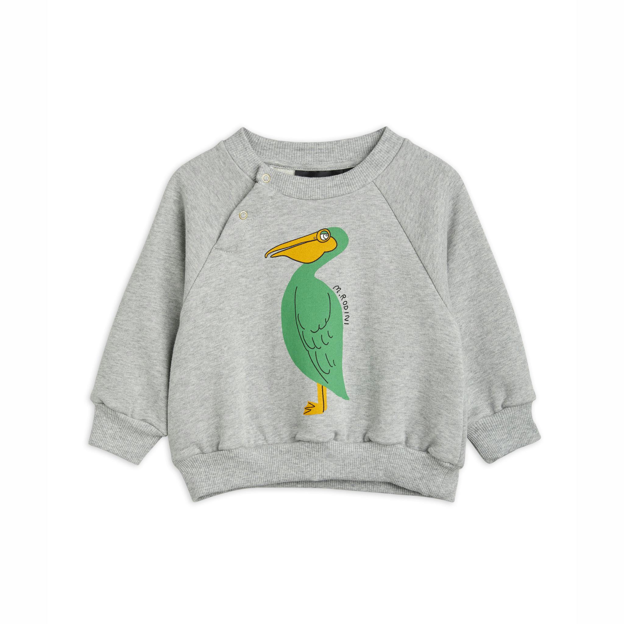 Grå sweatshirt med en grön pelikan på från Mini Rodini.