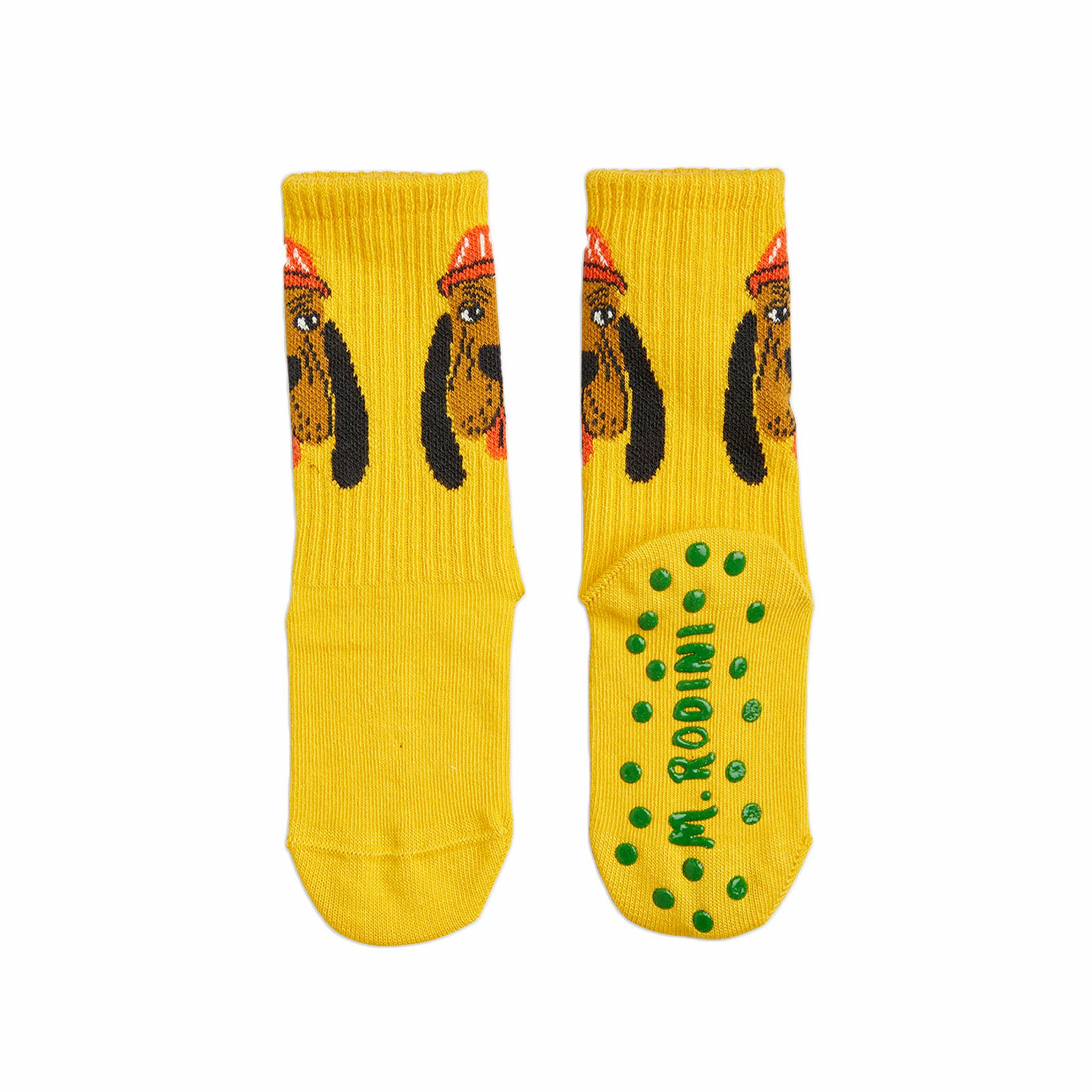 Antislip socks bloodhound i färgen yellow från Mini Rodini.