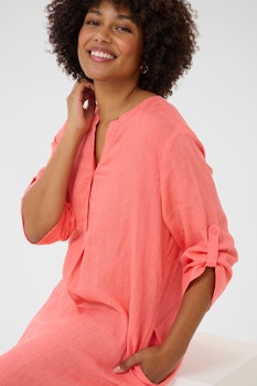 Caftan dress. Orange .